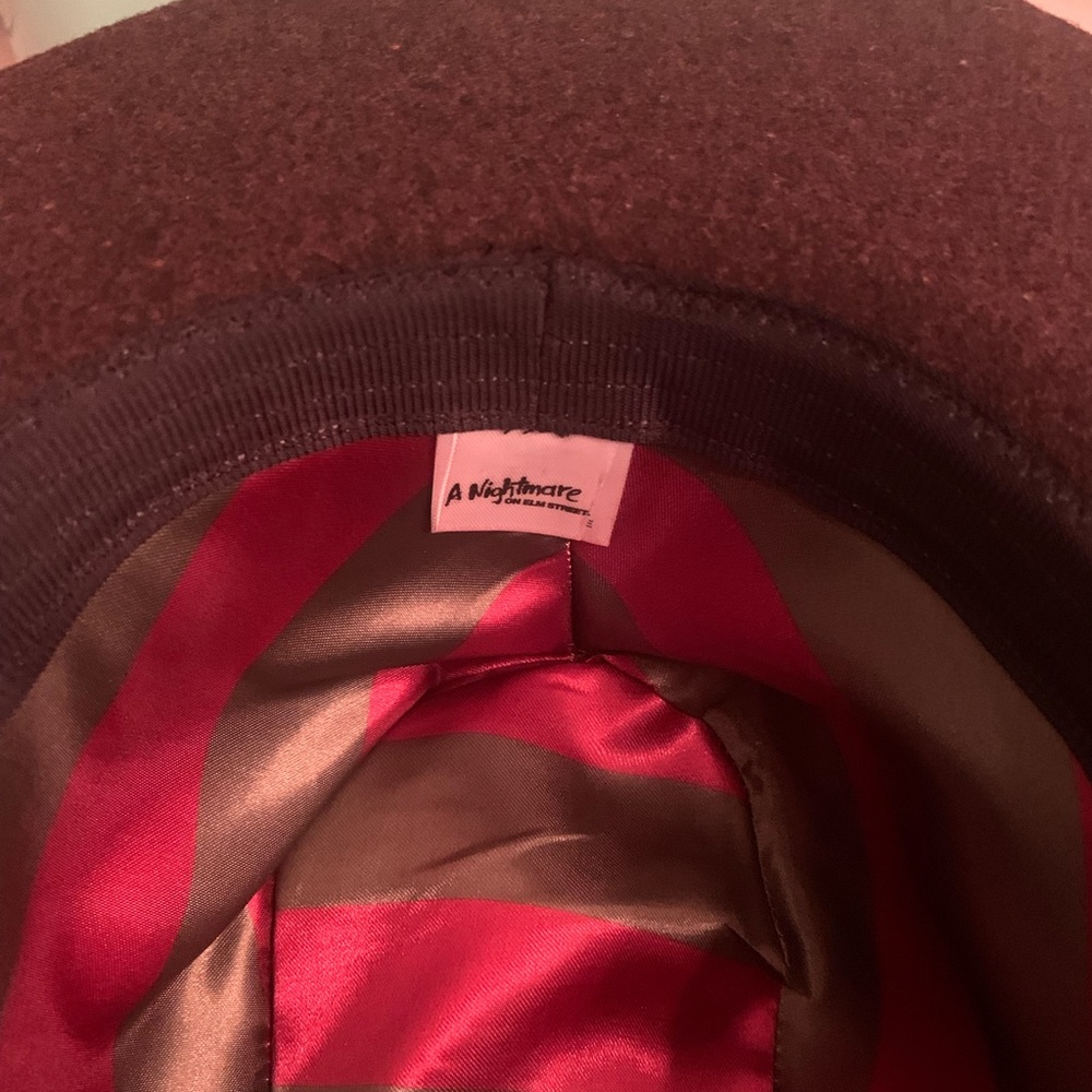 Authentic branded Nightmare Elm Street Freddy Hat with colors inside. Halloween